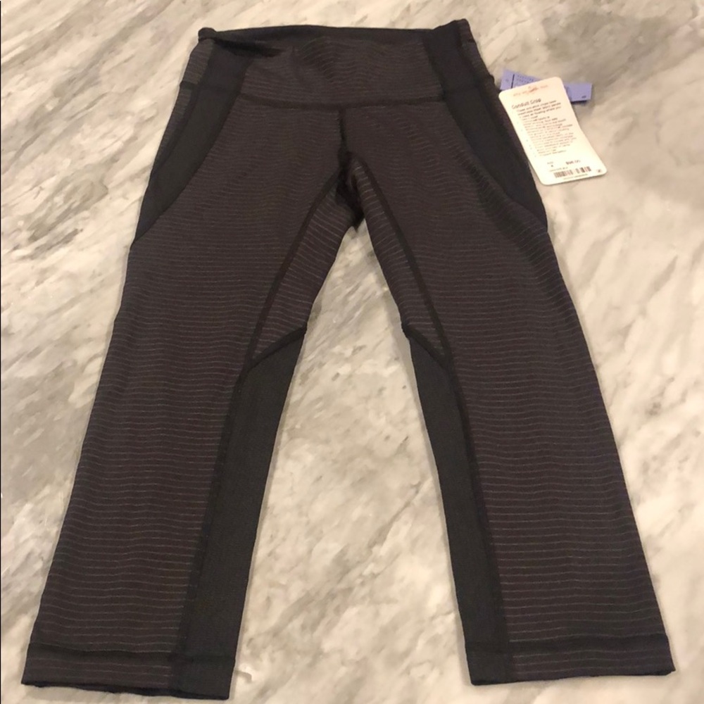 New Conduit Crop black Striped Sz. 4